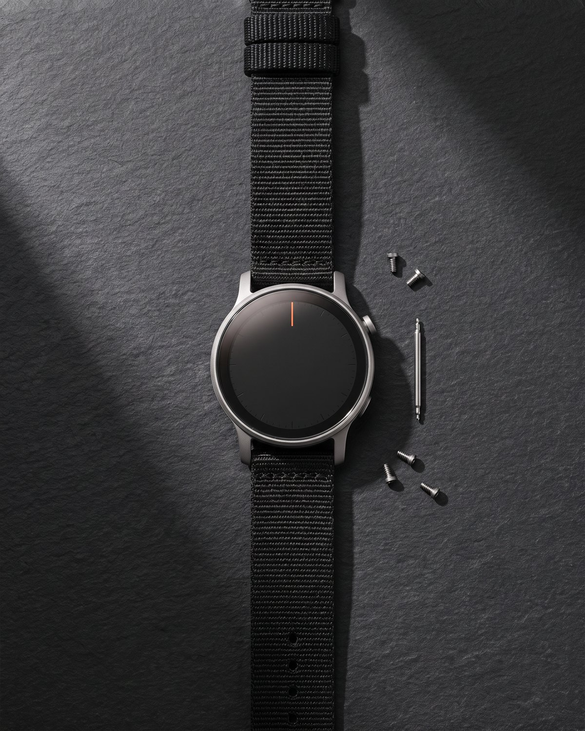Tabula watch, flat lay, titanium case and woven strap